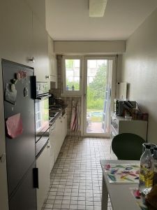 Kitchen, with back garden